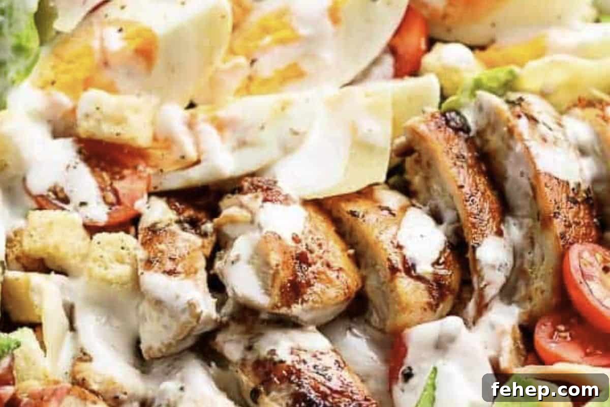 Slice the chicken and chop the bacon. In a bowl, combine romaine lettuce, avocado, tomatoes, parmesan, and croutons. Top with chicken, bacon, and eggs, drizzle with dressing, toss gently, and serve.