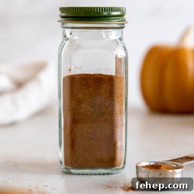 pumpkin pie spice in a glass spice jar