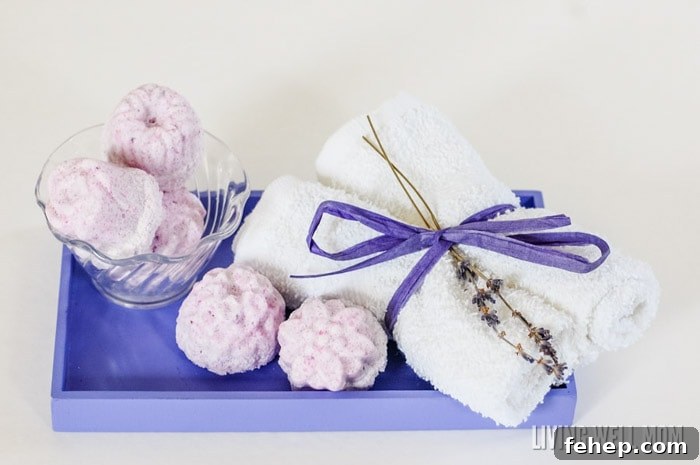 purple tray with essential oil bath bombs and washcloths