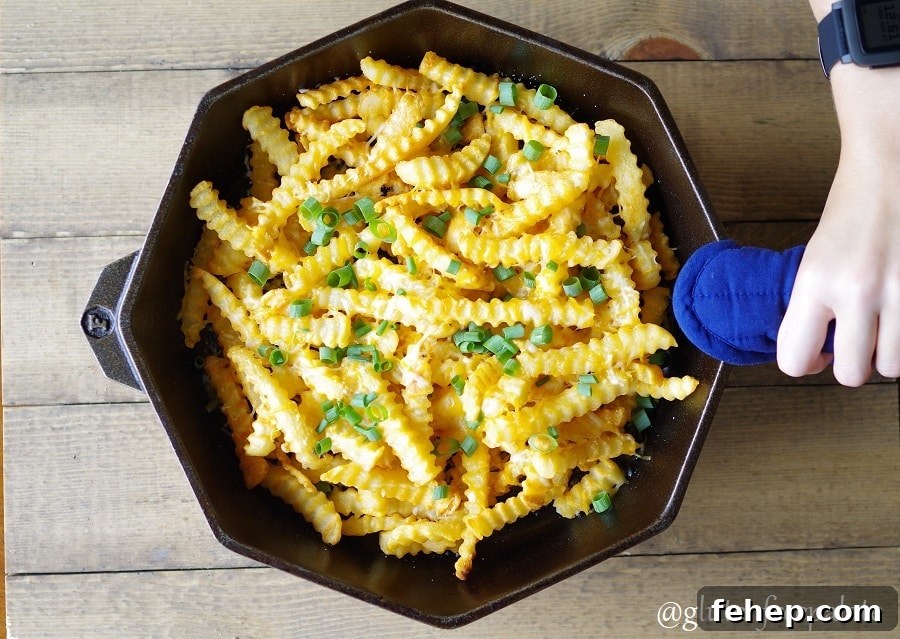 Gluten-Free Camping Meal Ideas for Delicious Outdoor Cooking 13 fries and chopped green onion in a cast iron skillet