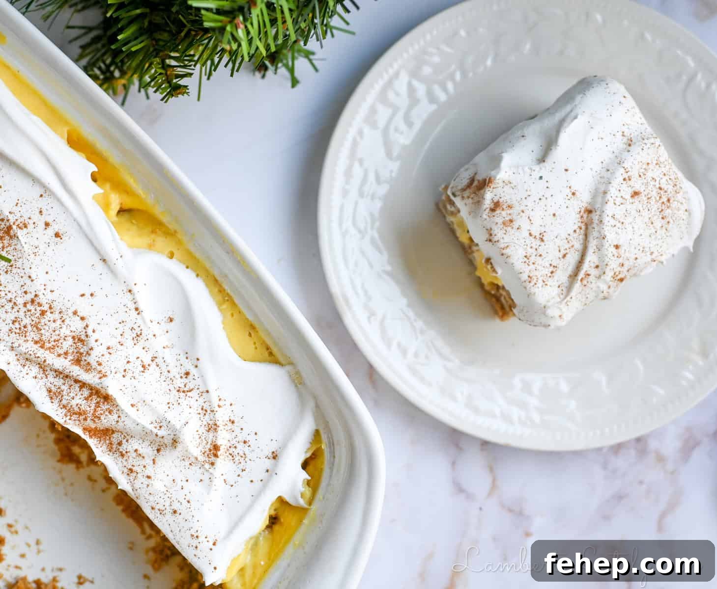 Creamy Eggnog Poke Cake Recipe for Holiday Gatherings 8 a piece of eggnog poke cake on a plate, next to a baking dish of cake.