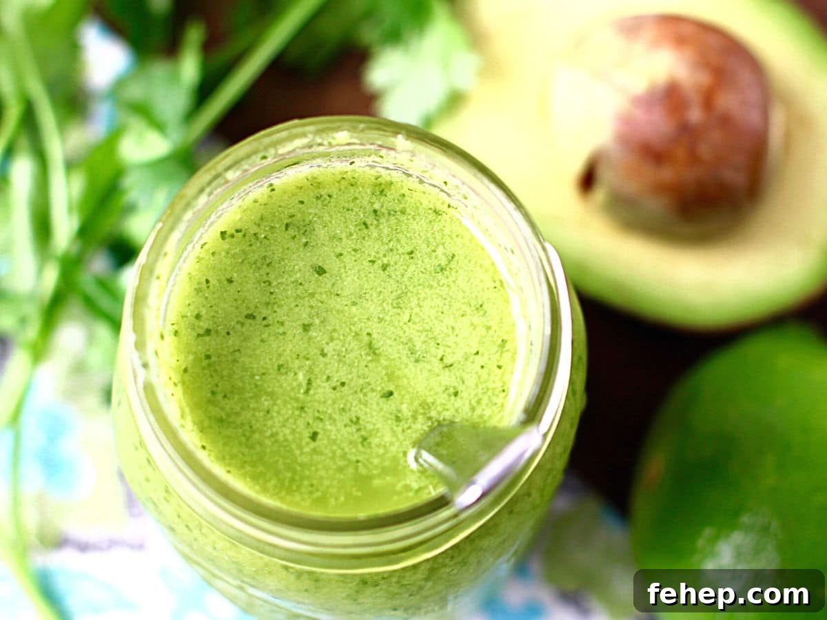 Homemade avocado dressing in a jar.