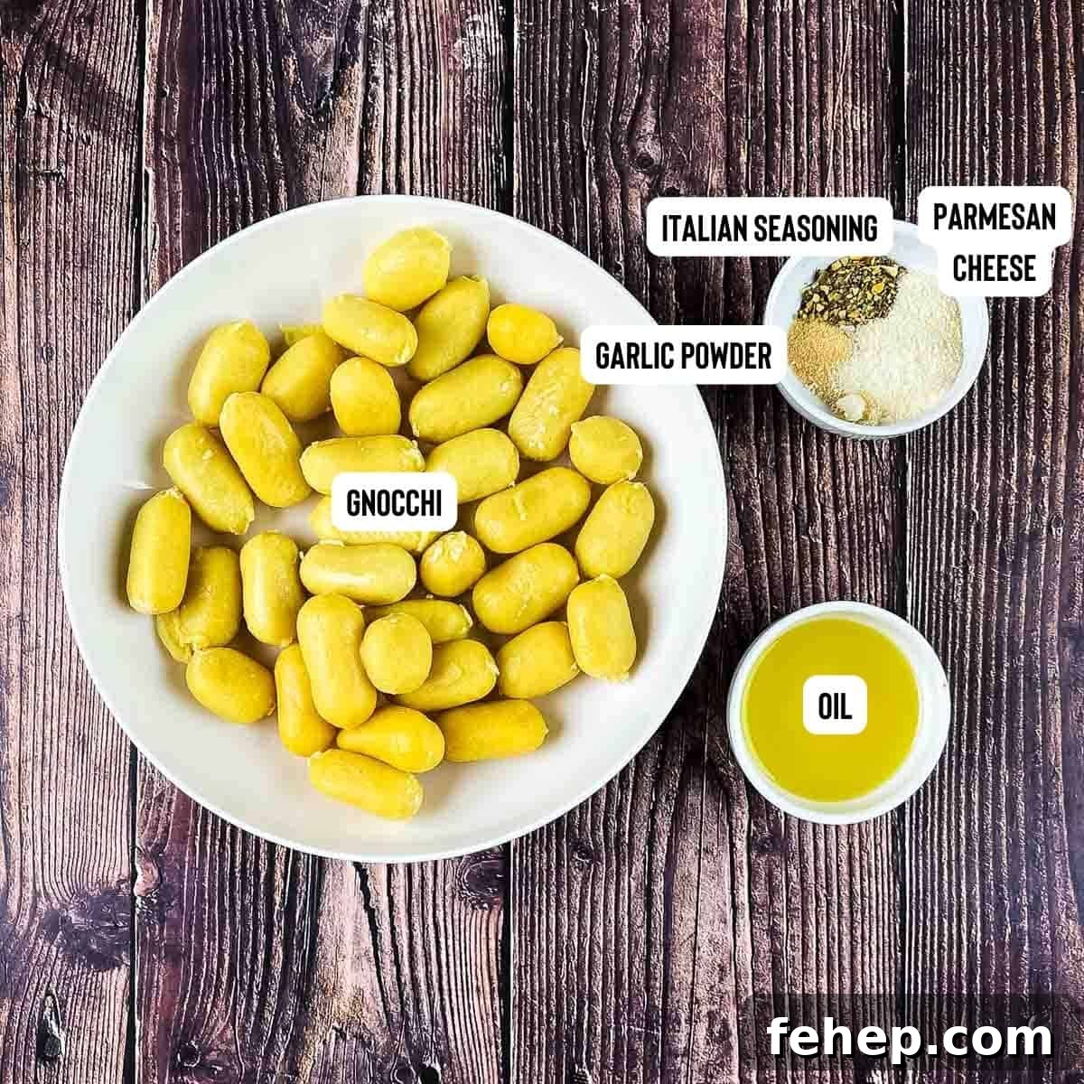 Crispy Air-Fried Gnocchi with Garlic Parmesan Crunch 3 Ingredients for Air Fryer Gnocchi placed on a wooden table.