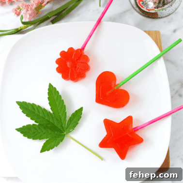 How to Make Cannabis-Infused Candy Ropes at Home 14 A white plate with 3 red cannabis lollipops laying on it with a cannabis leaf on the left side for garnish