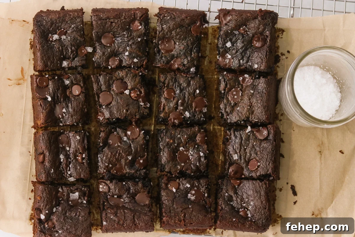 Sweet potato brownies sliced on brown parchment paper.