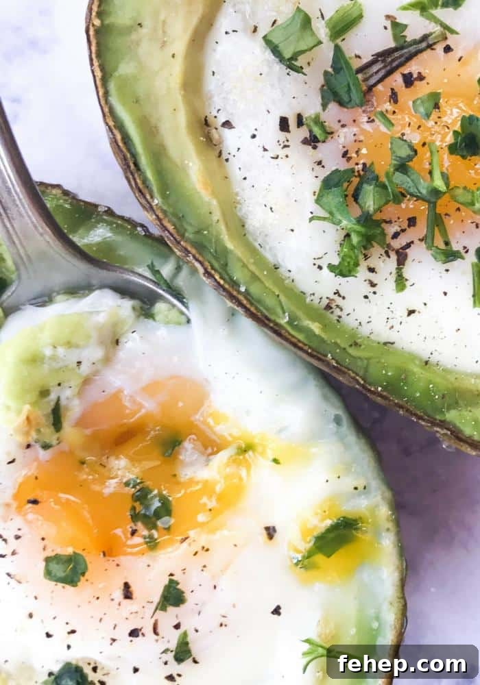 Baked Avocado Egg Boats: Simple Breakfast Recipe with Crispy Edges 3 Baked Egg Avocado Boats The Whole Cook VERTICAL FEATURE