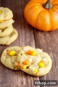 Peanut Butter Candy Corn Cookies for Halloween Parties 2 Peanut Butter Candy Corn Cookies take the rich creaminess of peanut butter and combine it with the vanilla and honey sweetness of classic candy corn to make a perfect and delicious Fall and Halloween treat for kids, party, and everyone!