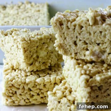a close up of a few marshmallows with a white back drop.