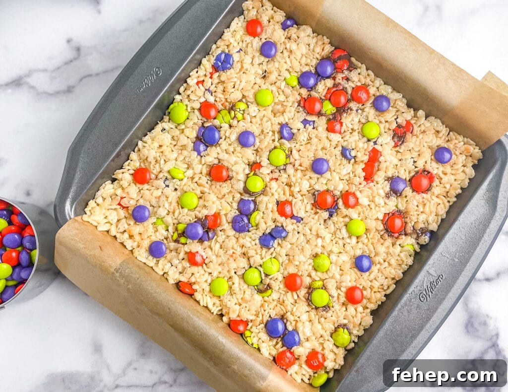 Press Fresh M&Ms into the treats