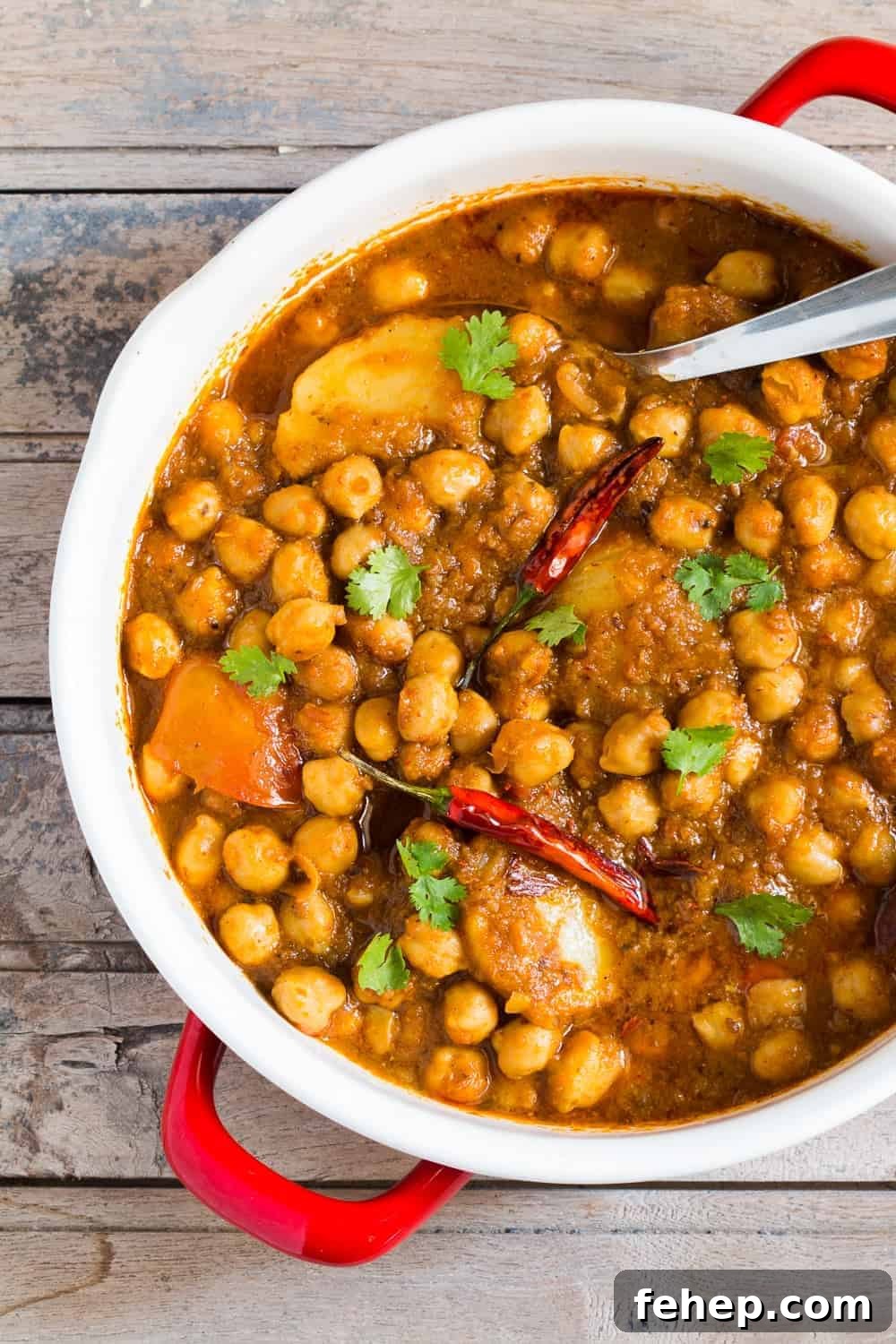 a close up of chana aloo masala