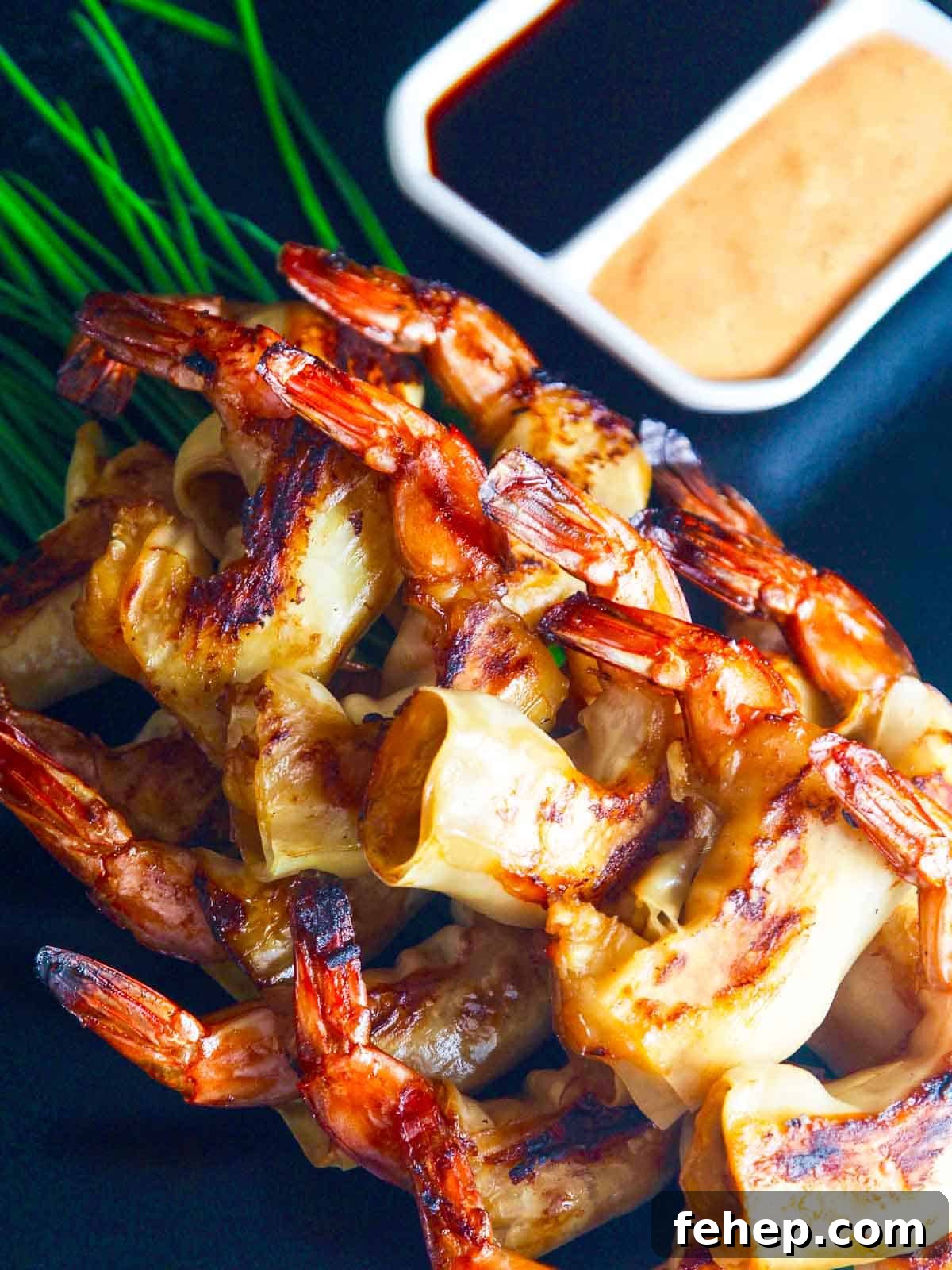 Crispy Firecracker Shrimp Recipe with Sweet-Spicy Sauce 2 Firecracker shrimp plated with dipping sauces