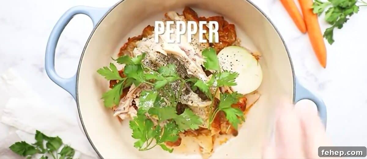 Classic Chicken and Dumplings Recipe for Comforting Weeknight Dinner 3 Placing all the ingredients to make the soup broth in a Dutch oven.