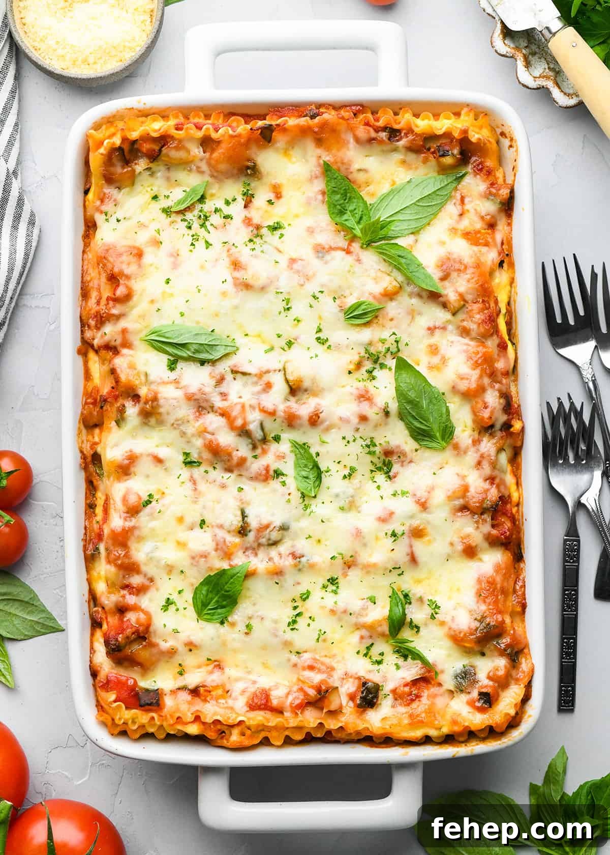 Hearty Vegetable Lasagna Recipe with Spinach & Ricotta 13 Vegetable Lasagna in a baking dish