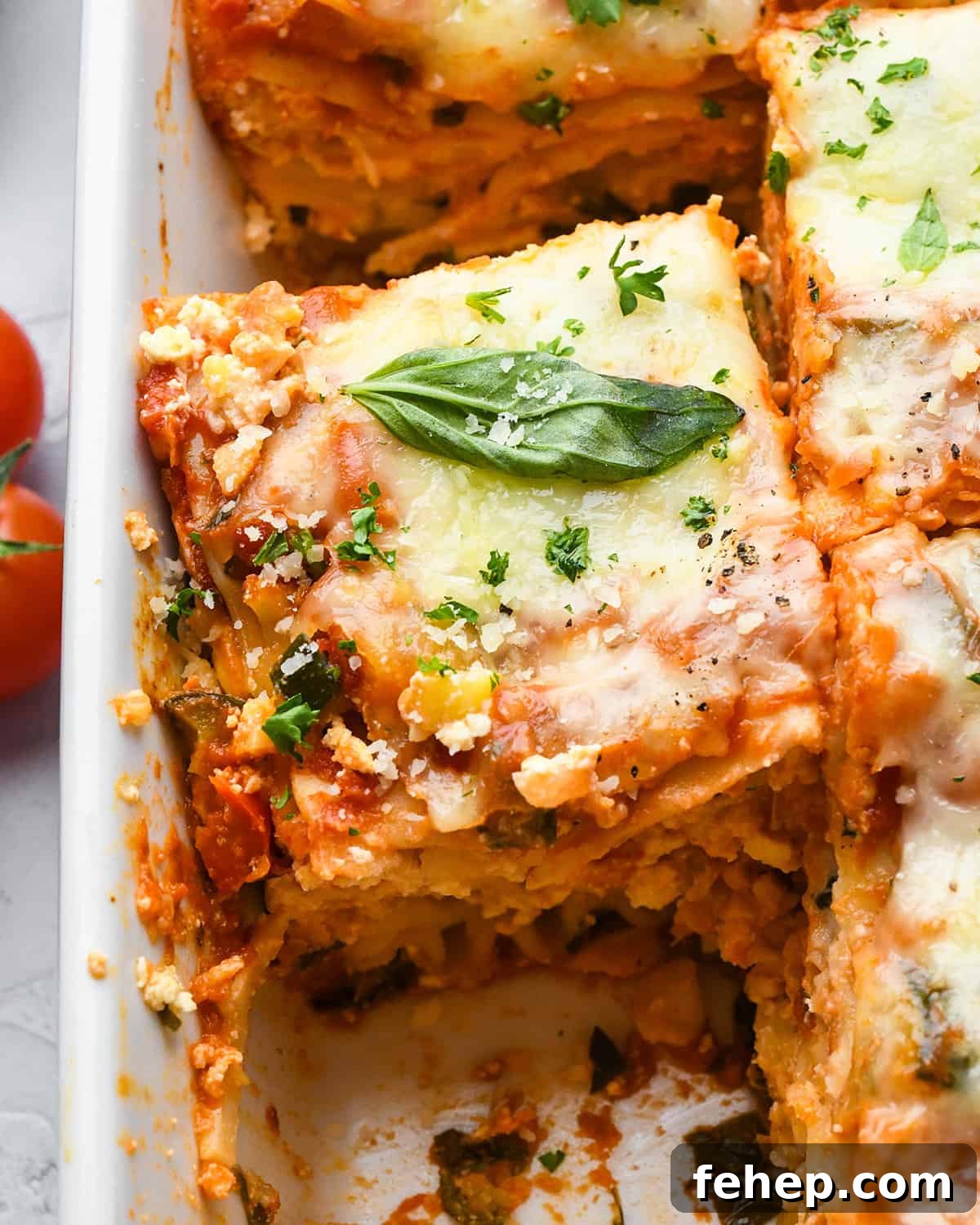 Hearty Vegetable Lasagna Recipe with Spinach & Ricotta 3 Vegetable Lasagna in a baking dish
