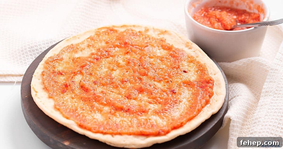 19 Authentic Italian Dinners That Feel Effortless and Homey 11 Pizza sauce in bowl and spread out on a pizza crust.