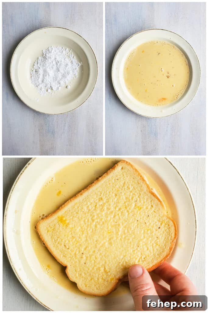 Dipping french toast in egg mixture Hand dipping french toast in egg mixture in a white bowl.