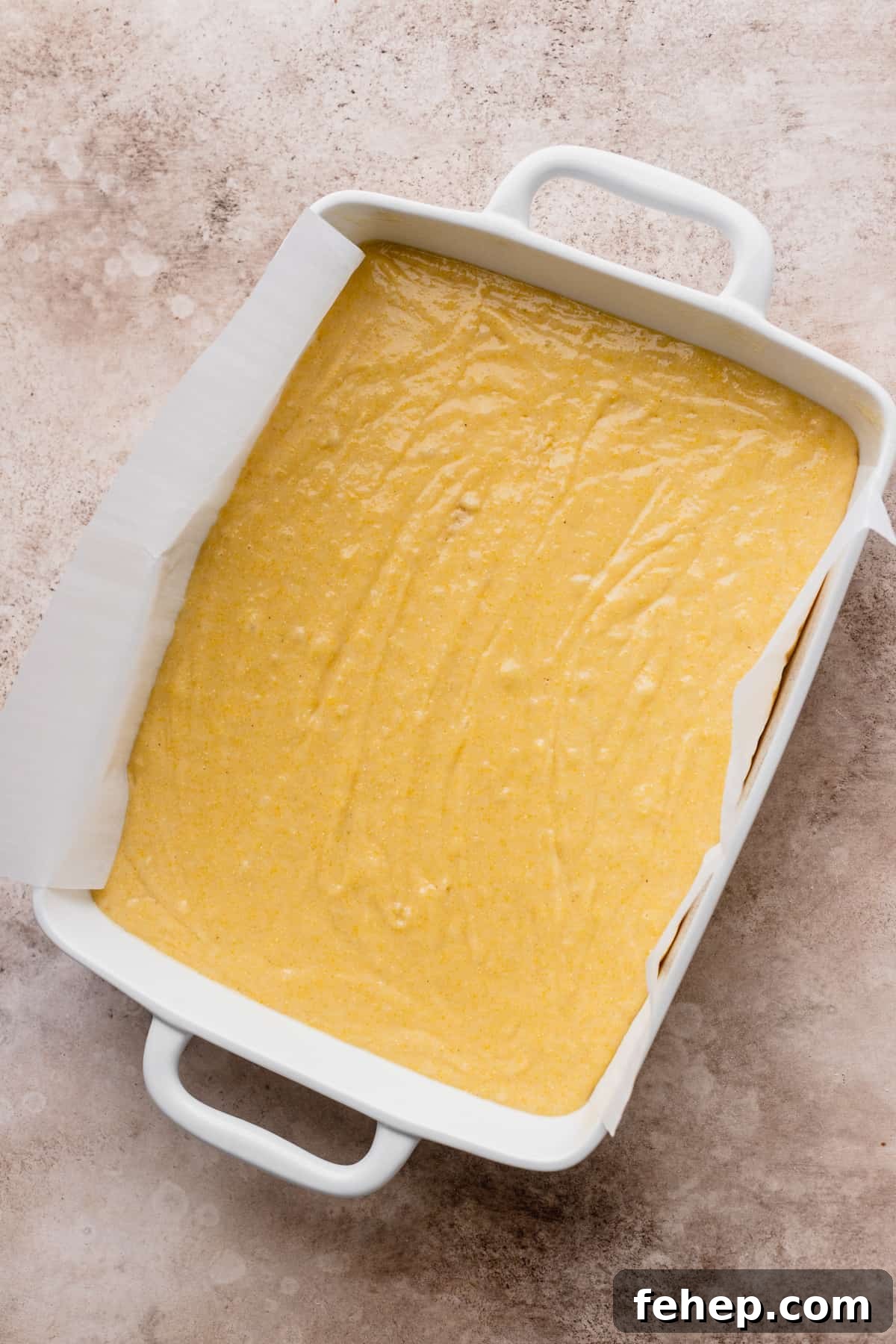 Honey Butter Cornbread Recipe — Sweet Savory Cornbread Guide 7 Batter in a pan.