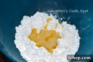 Add melted ghee to maida