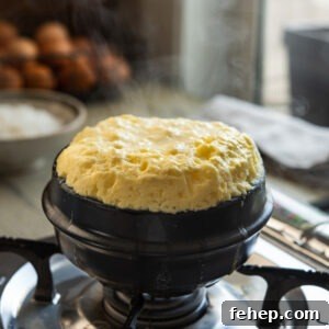 Steaming hot volcanic Korean egg cooked in a stone pot.