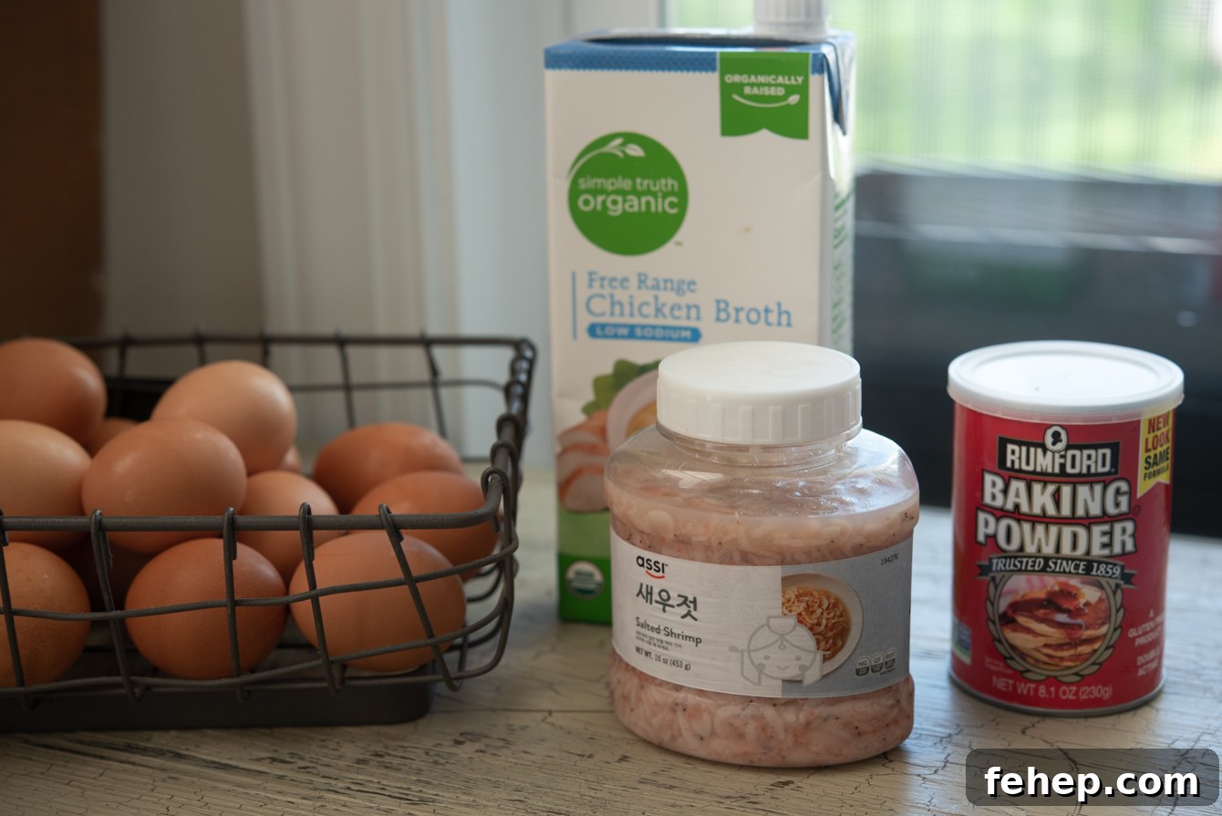 Ingredients for gyeran jjim: eggs, chicken broth, salted shrimp, and baking powder