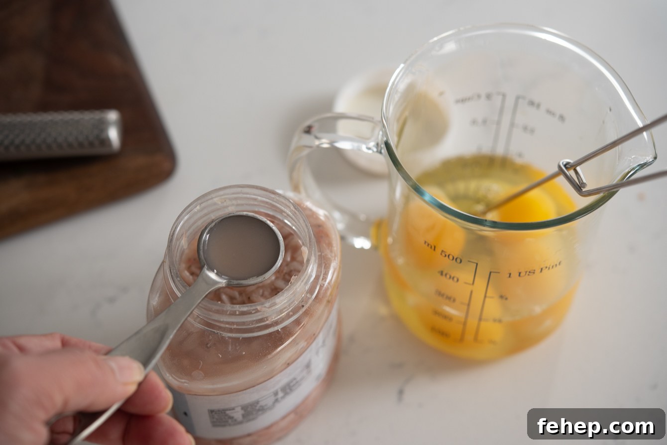 A teaspoon of Korean salted shrimp (saeujeot) for seasoning the egg mixture.