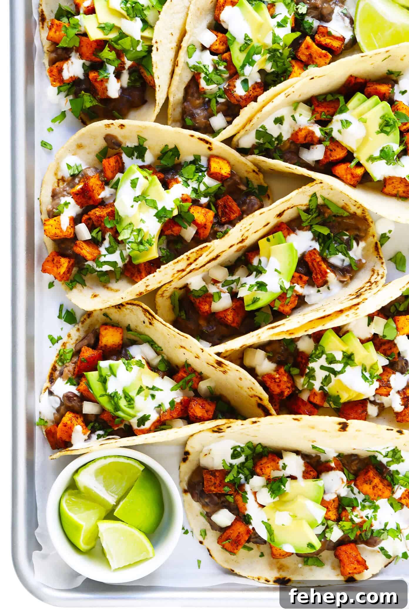 This homemade corn tortilla recipe is easy to make with 3 ingredients and yields the most delicious, soft, foldable, and naturally gluten-free corn tortillas. Perfect for tacos, enchiladas, chilaquiles, nachos, tortilla chips and more! | gimmesomeoven.com #corn #tortillas #mexican #texmex #homemade #vegan #vegetarian #glutenfree #healthy #dinner Sweet Potato Black Bean Tacos with Homemade Corn Tortillas