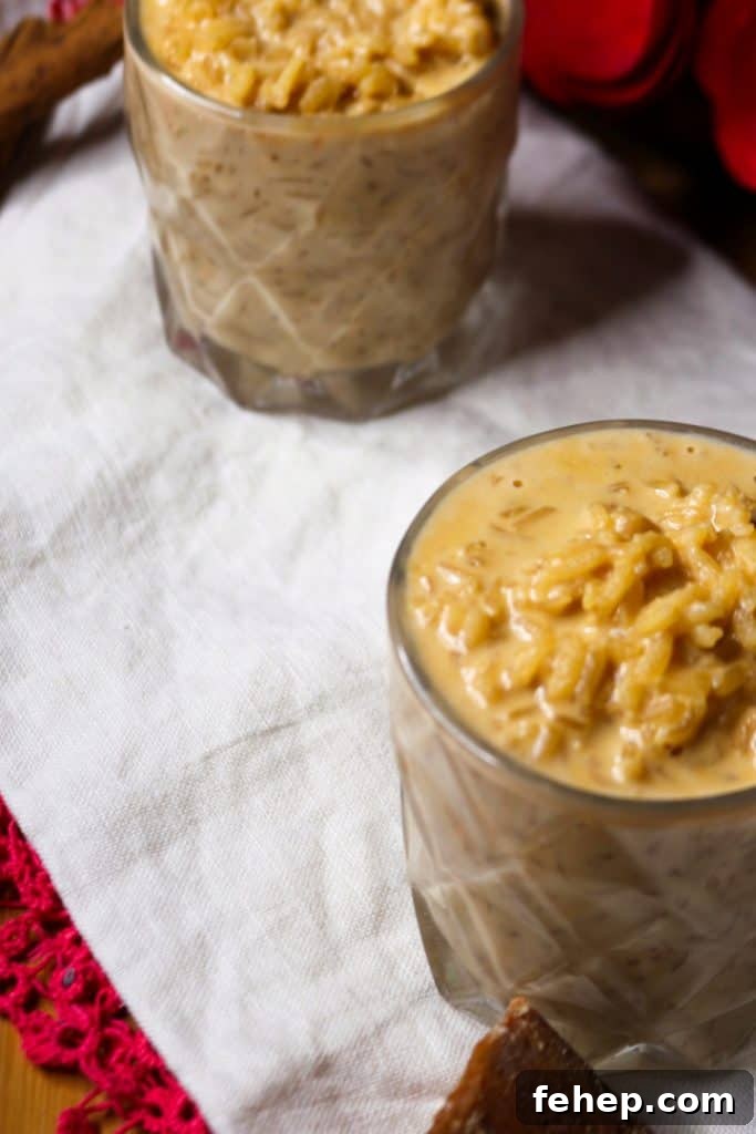 Side view of two glass cups with arroz con leche