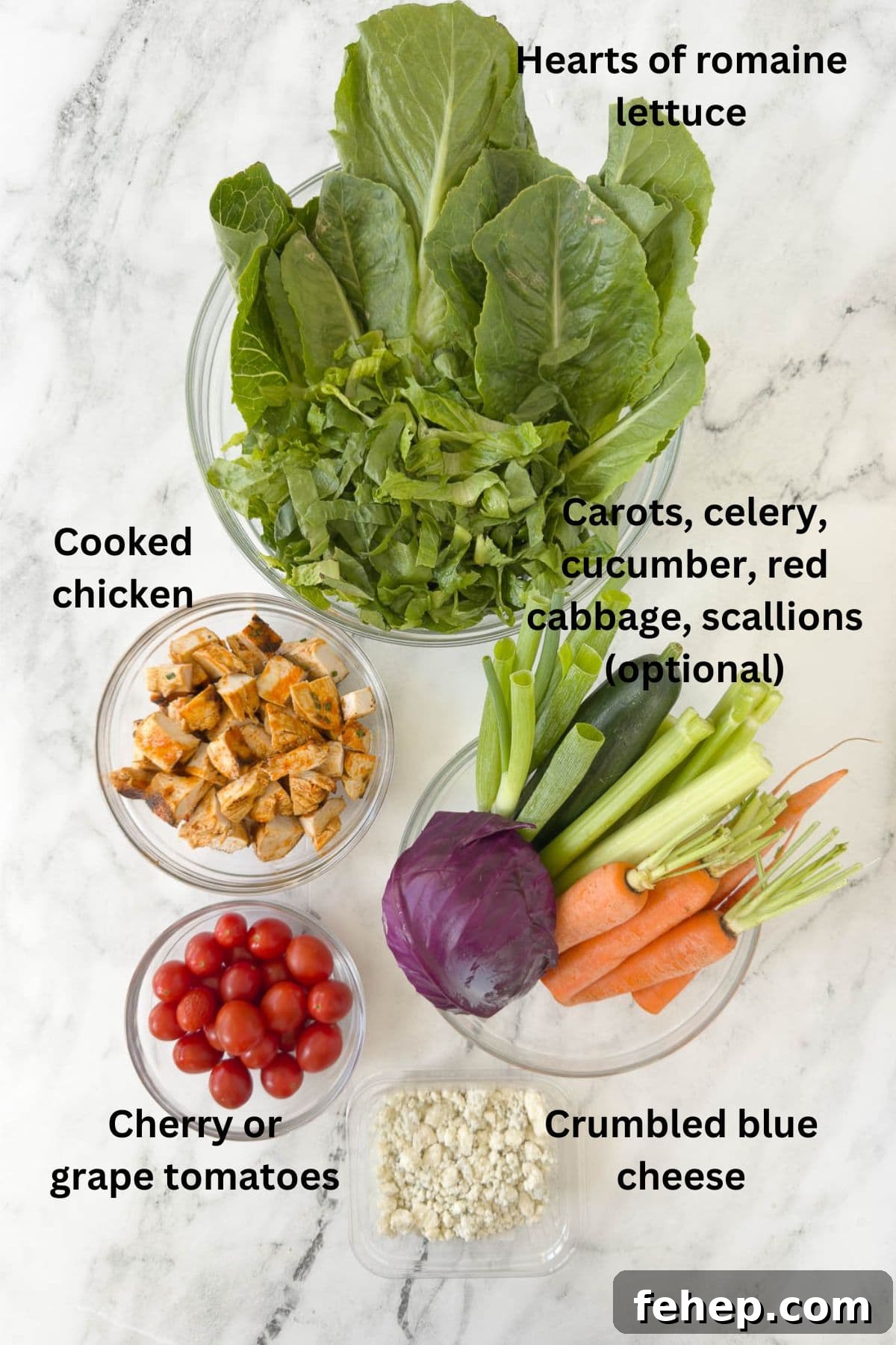 Spicy Buffalo Chicken Salad Recipe with Creamy Ranch Dressing 3 Ingredients for a buffalo chicken salad with carrots, celery, tomatoes, and romaine.