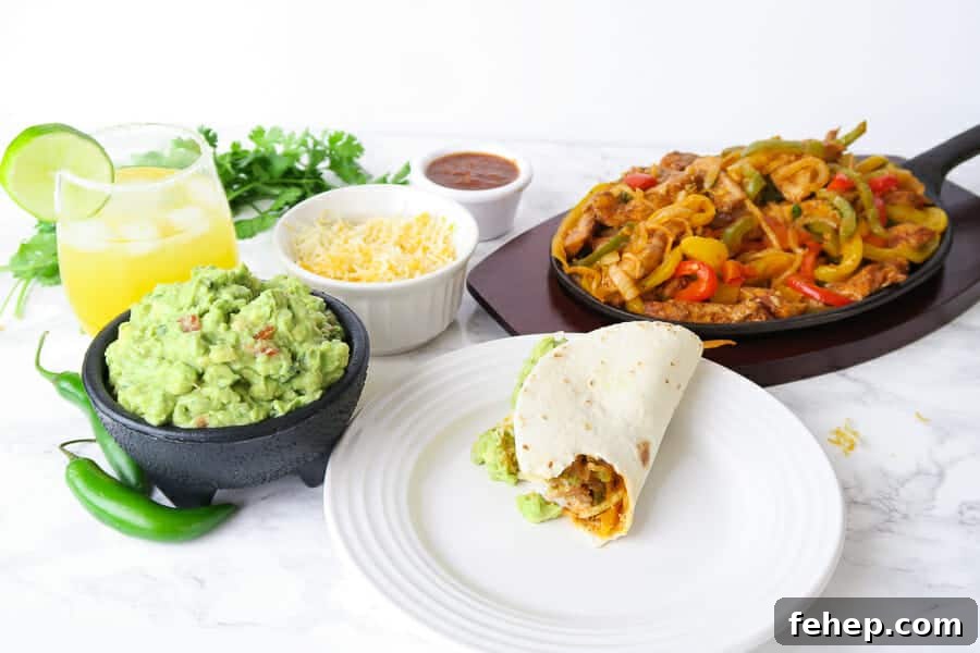30-Minute Sheet Pan Chicken Fajitas Meal 10 fun fiesta night meal featuring flaming-sizzling chicken fajitas, authentic guacamole, and fresh-squeezed skinny margaritas
