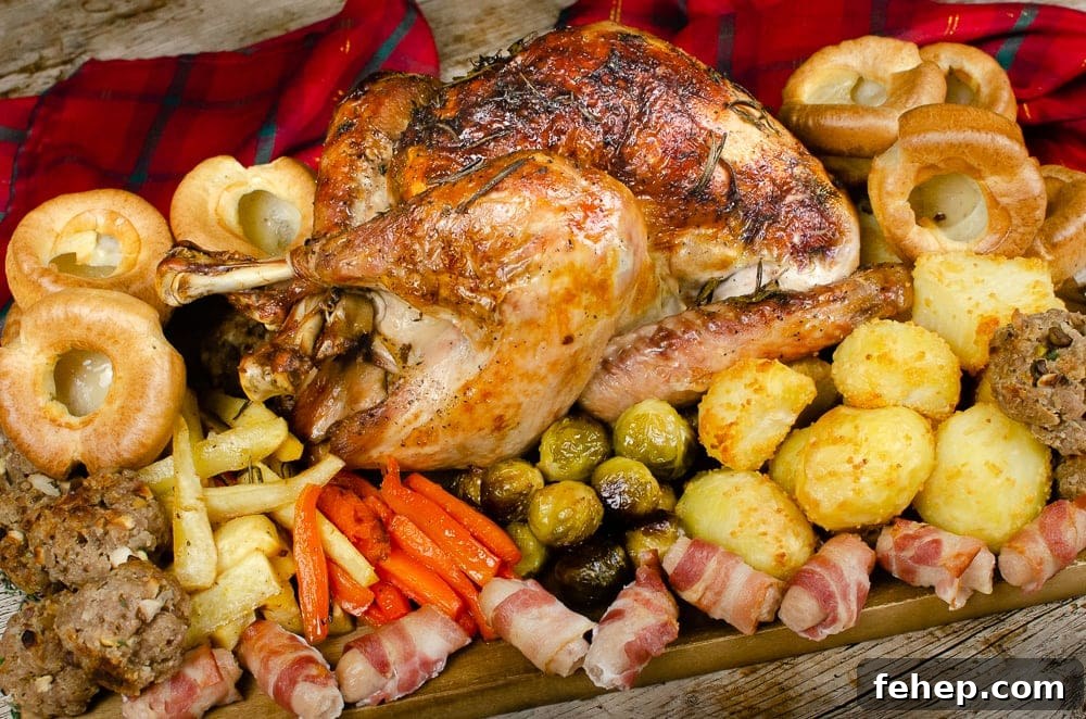 How to Roast a Small Whole Turkey: Step-by-Step Guide 2 Our cooked small turkey served on a brown wooden chopping board with all the trimmings like Flawless Yorkshire puddings, Flawless roast potatoes, pigs in blankets, stuffing balls and maple glazed carrots, parsnips and Brussels sprouts