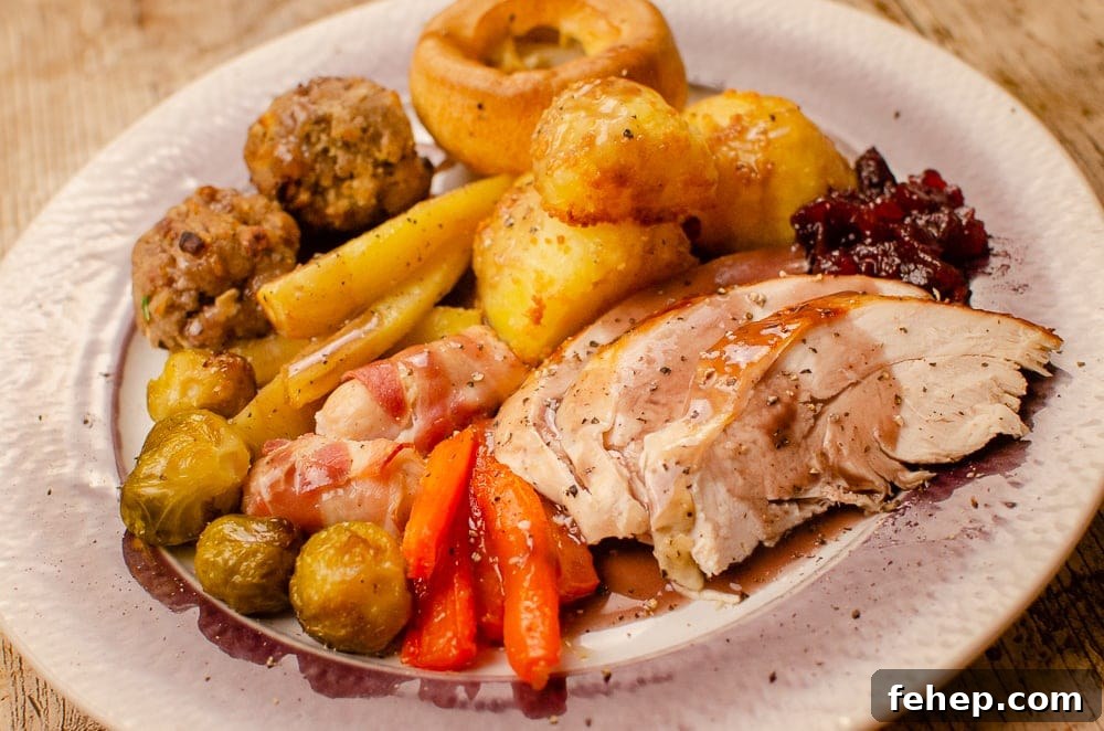 How to Roast a Small Whole Turkey: Step-by-Step Guide 10 Sliced Whole Turkey breast served on a plate with trimmings