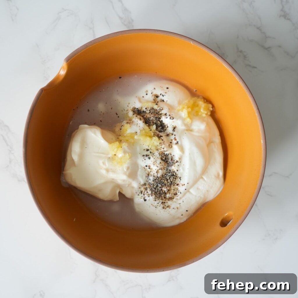 Ingredients for white sauce in a bowl. 