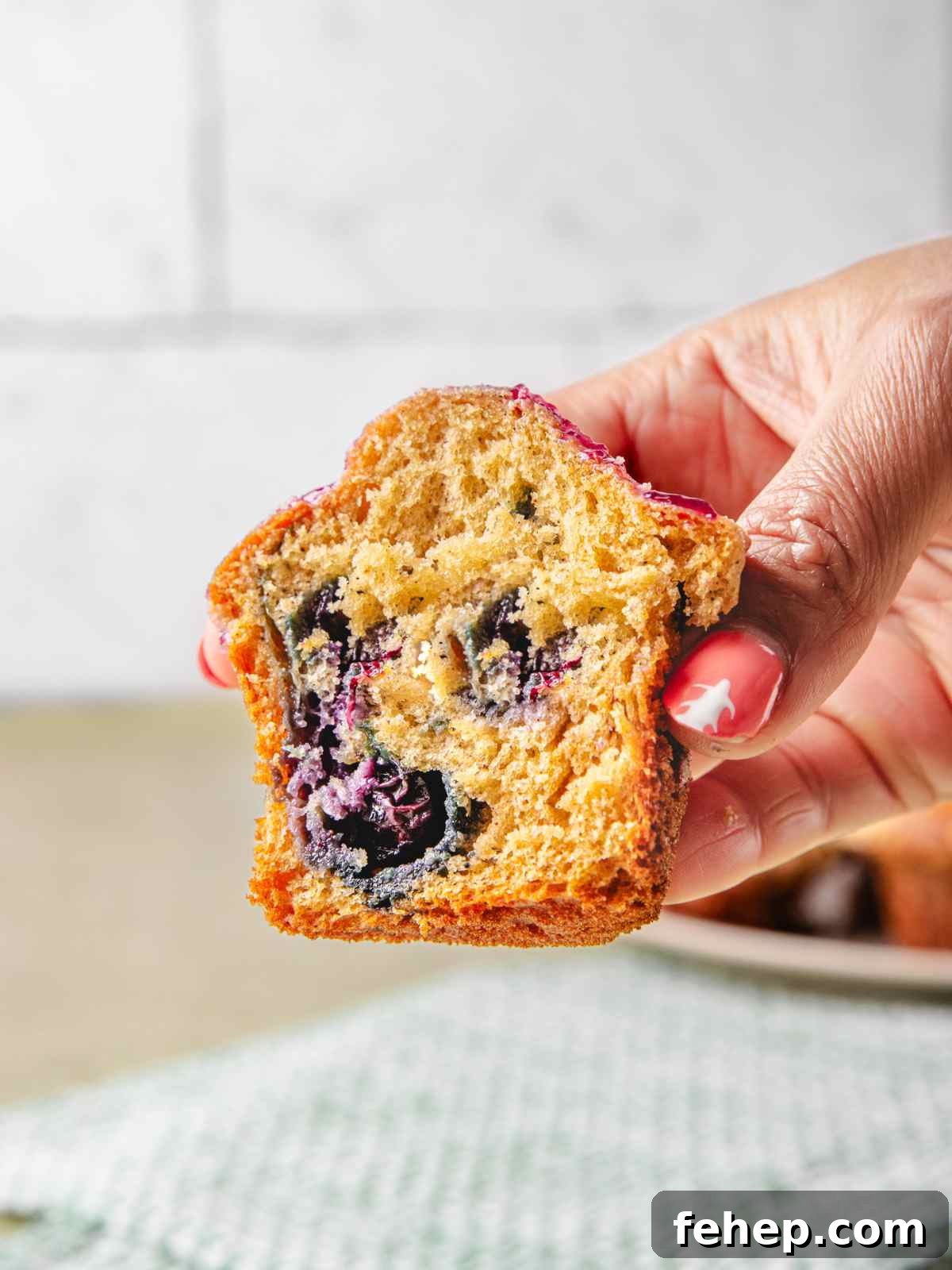 A close up look at the crumb and center of the muffins with cottage cheese.