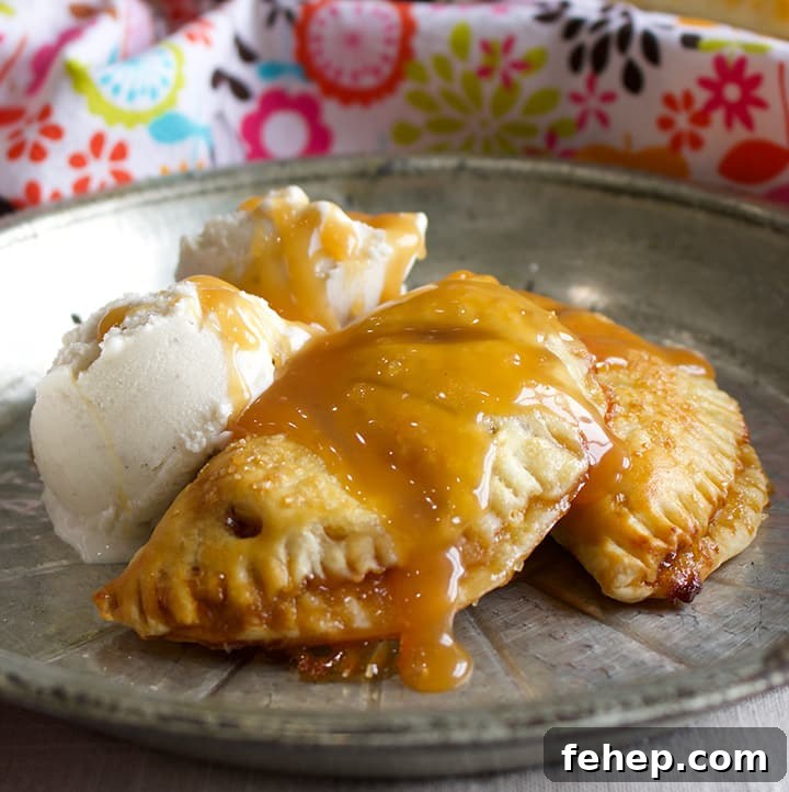 Slow-Cooker Apple Butter Recipe — No Peeling Needed 7 A plate of apple butter and pastry cream hand pies with vanilla ice cream and caramel sauce.