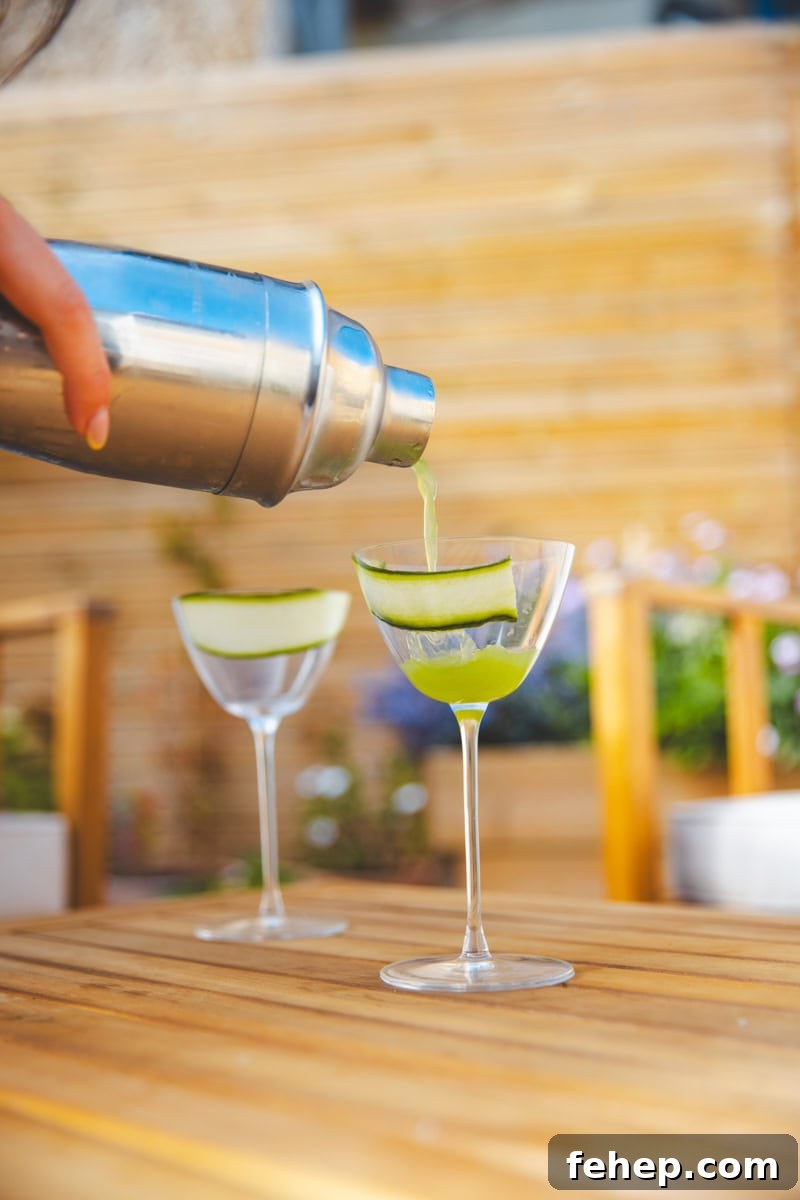 Pouring the Basil Gimlet - Georgie Eats