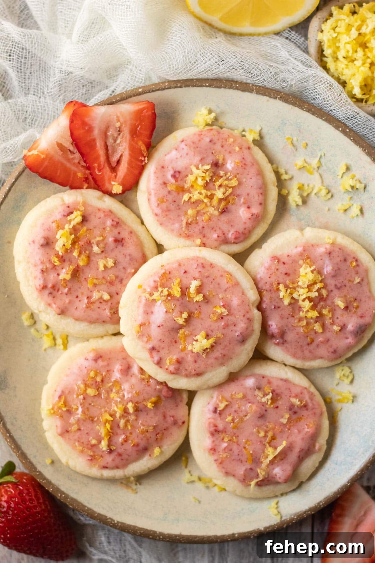 Lemon Shortbread Cookies with Strawberry Glaze Recipe 15 lemon shortbread cookies with strawberry glaze on a gray plate