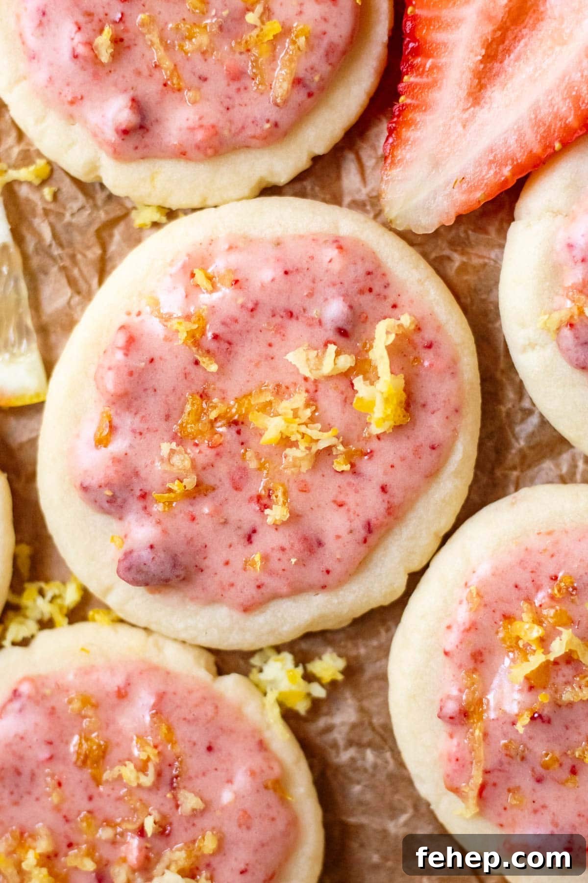 Lemon Shortbread Cookies with Strawberry Glaze Recipe 17 lemon shortbread cookies with strawberry glaze on parchment paper
