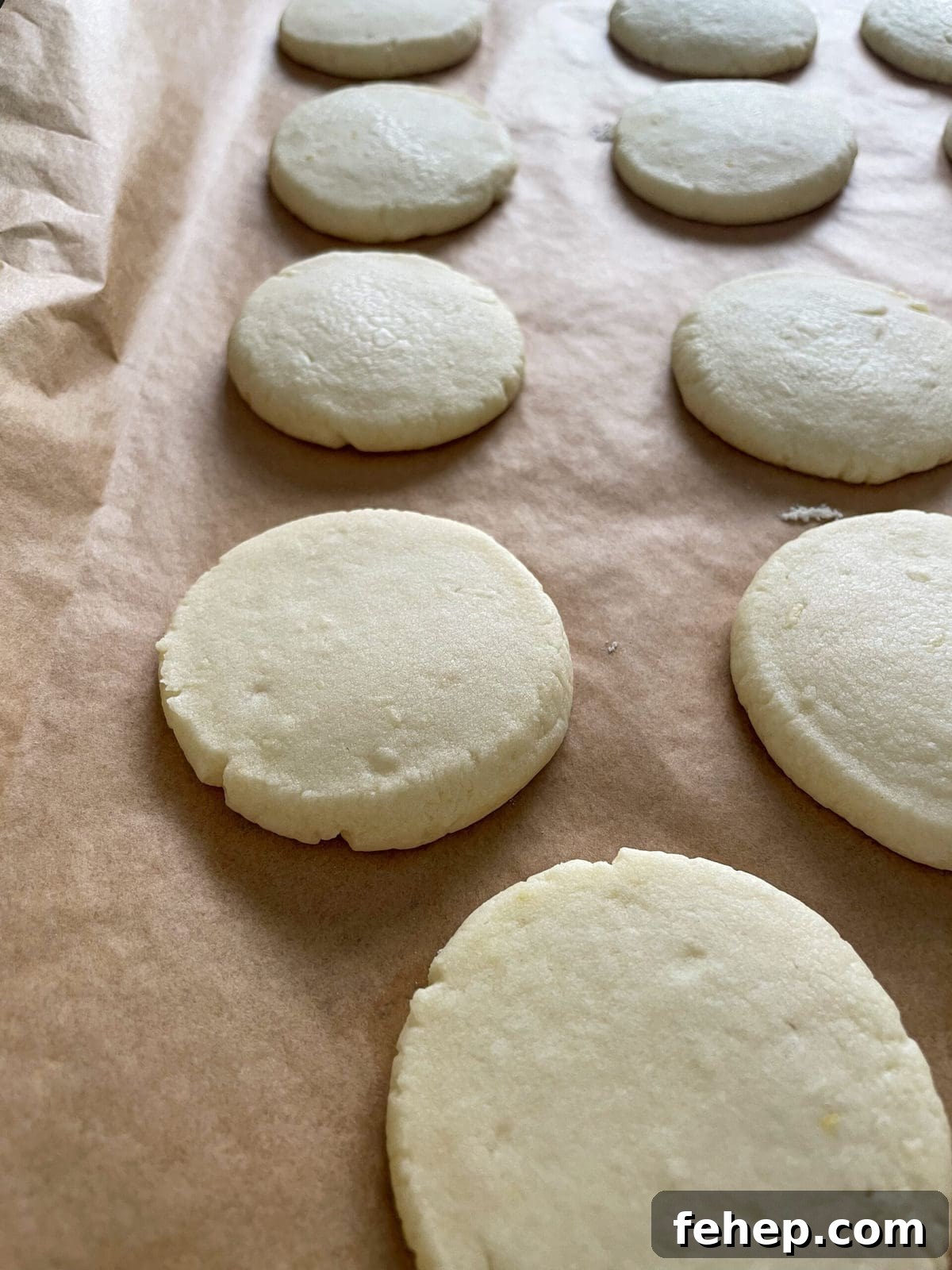 Lemon Shortbread Cookies with Strawberry Glaze Recipe 10 baked lemon shortbread cookies on baking sheet