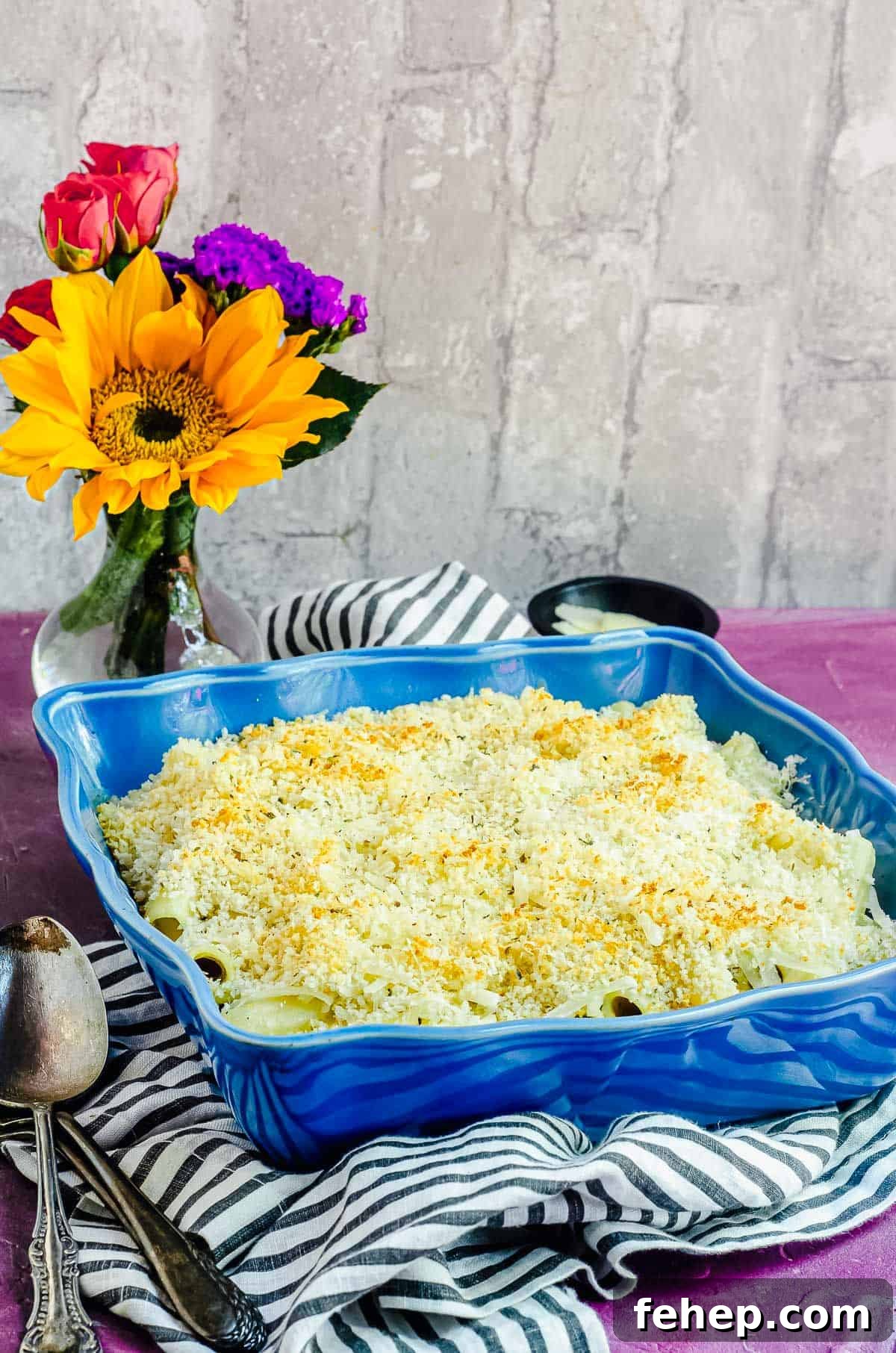 An angular view of Vegan Mac and Cheese in blue dish