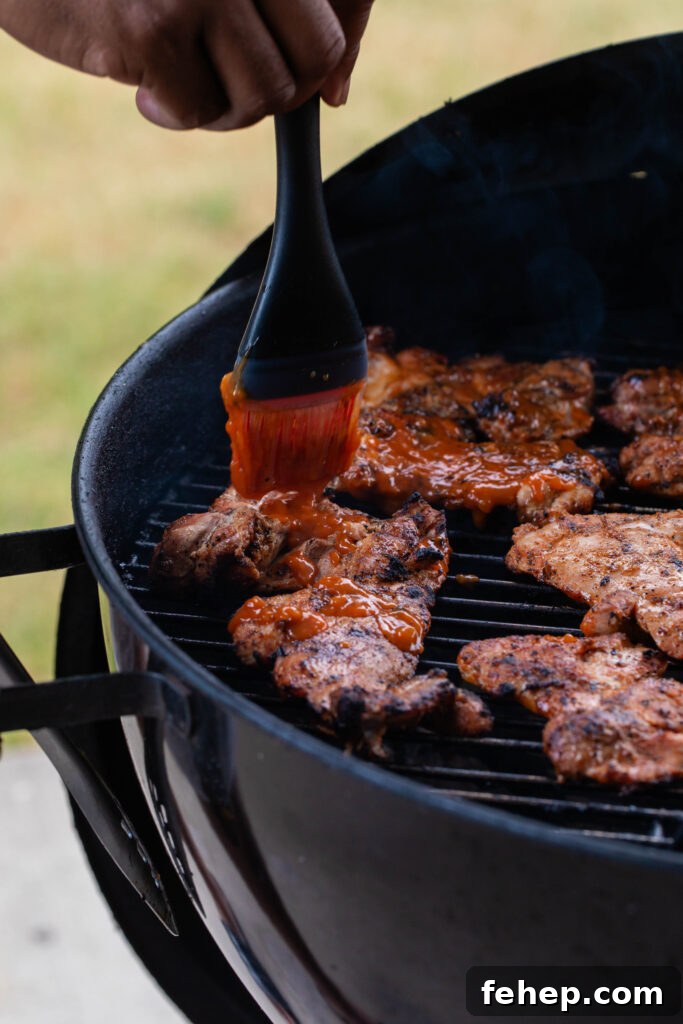 basting grilled chicken with peach bbq sauce