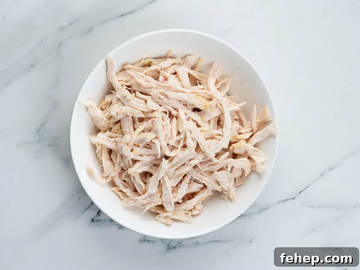 Poached chicken and shredded 