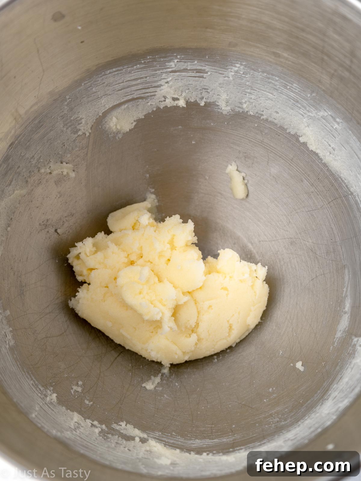Creamed butter and sugar in a bowl.