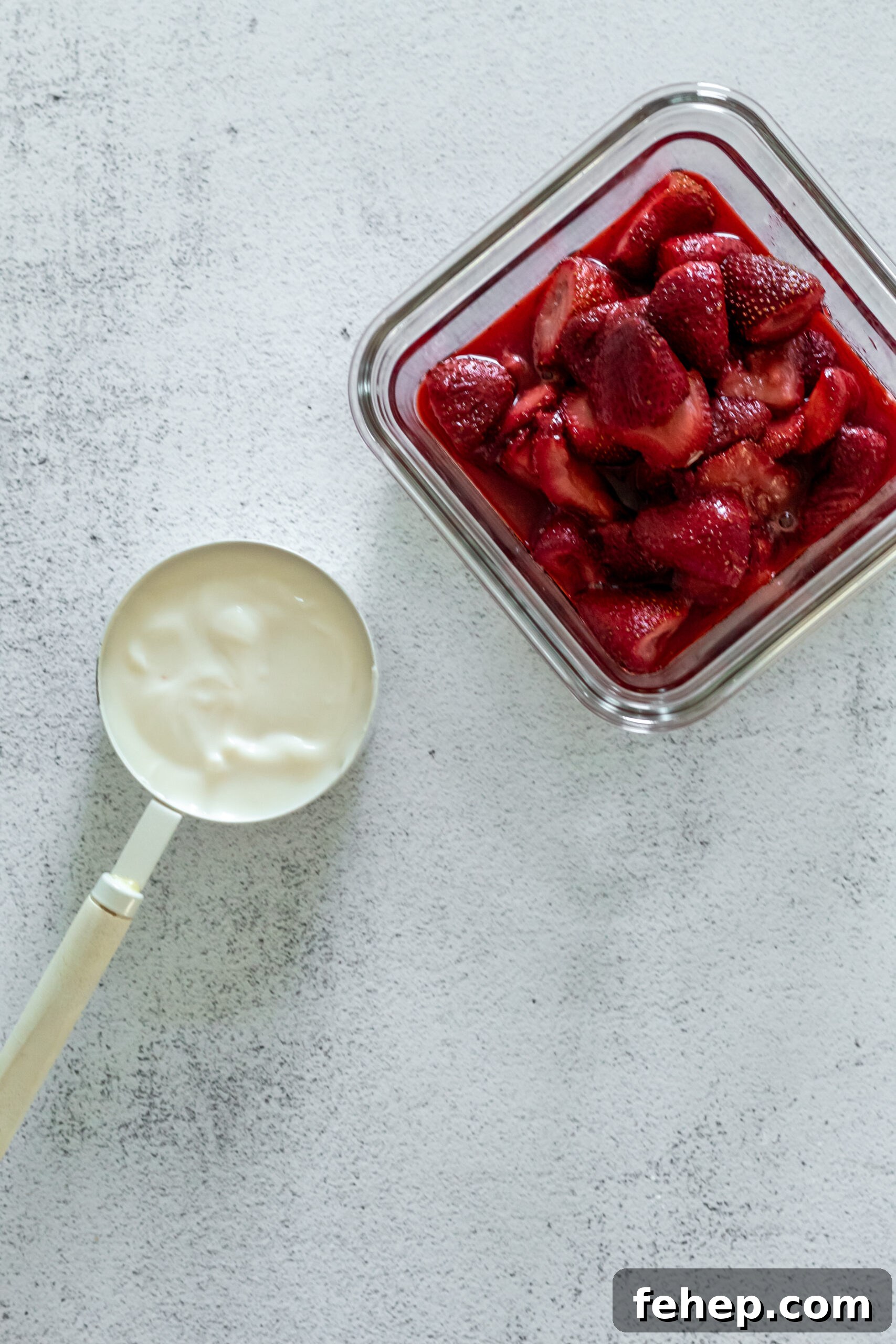 Ricotta cream and a dish with roasted strawberries.