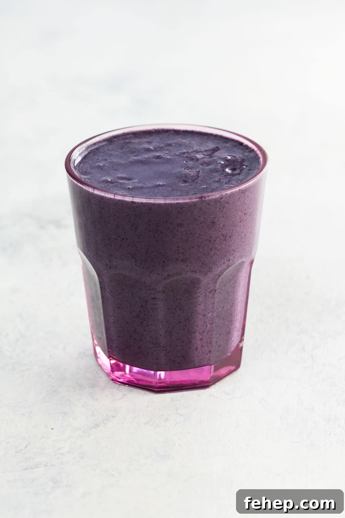 superfood smoothie with blueberries in a glass