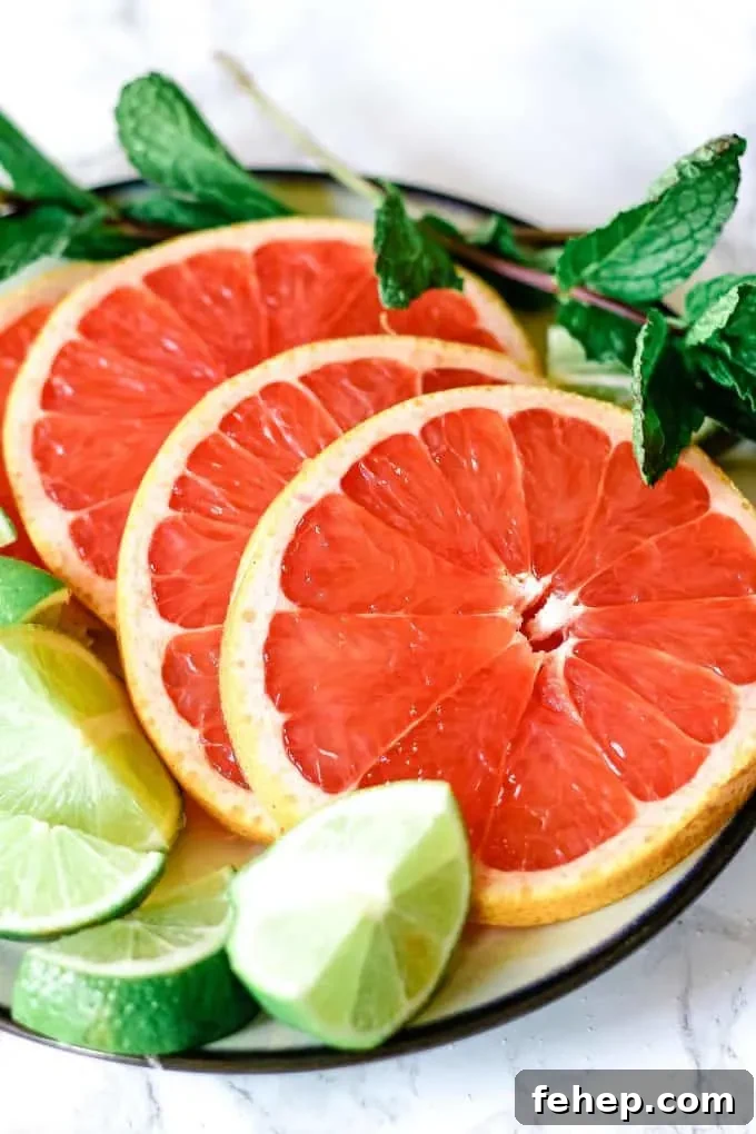 sliced grapefruit and limes