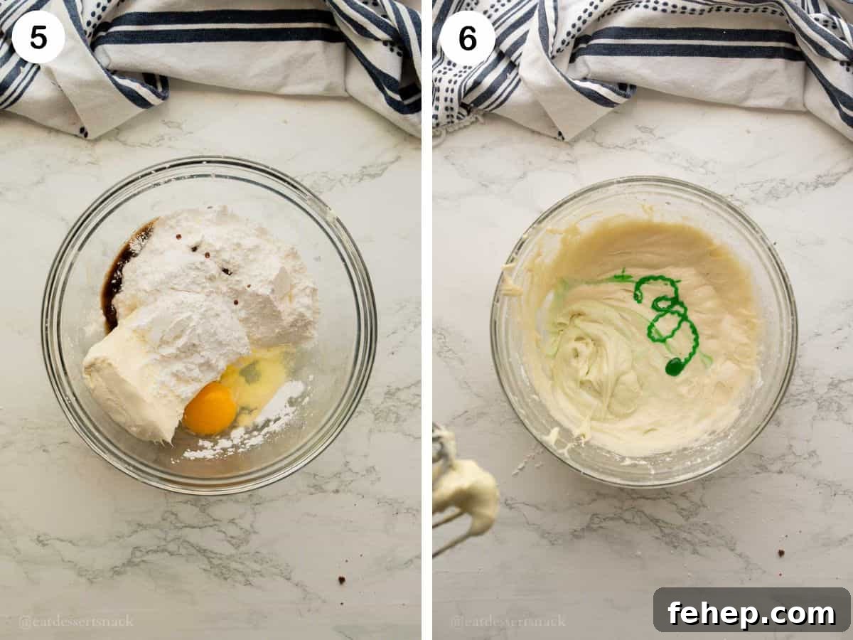 Ingredients for cream cheese filling in glass bowl, green food coloring in smooth bowl of filling.
