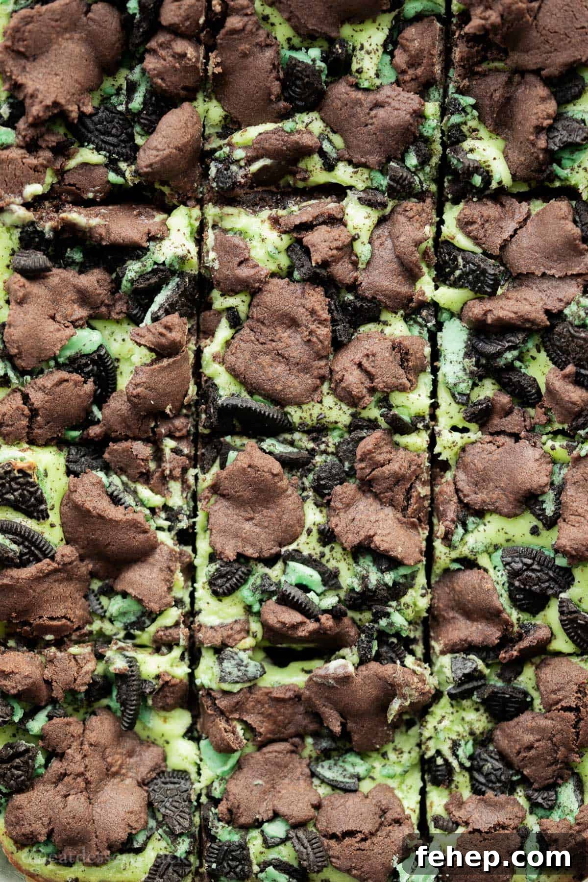 Sliced mint cheesecake brownies.