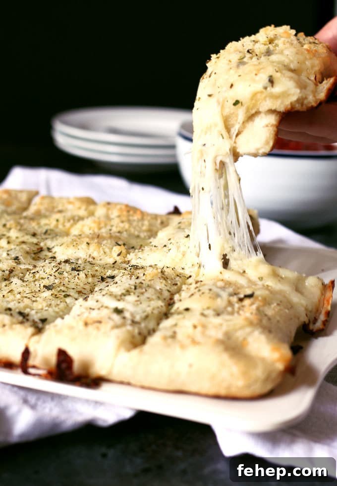 Chicago-Style deep dish breadsticks and super cheese pull