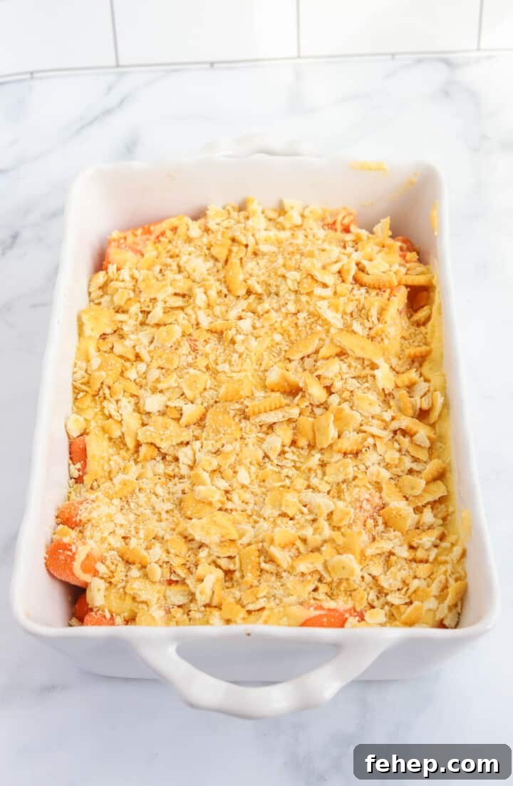 adding crushed Ritz crackers to the top of the casserole.